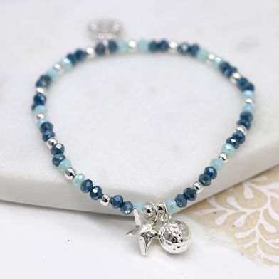 Silver plated and blue bead bracelet with star and ball by Peace Of Mind